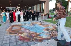 [wenner fotografa l'opera finita]